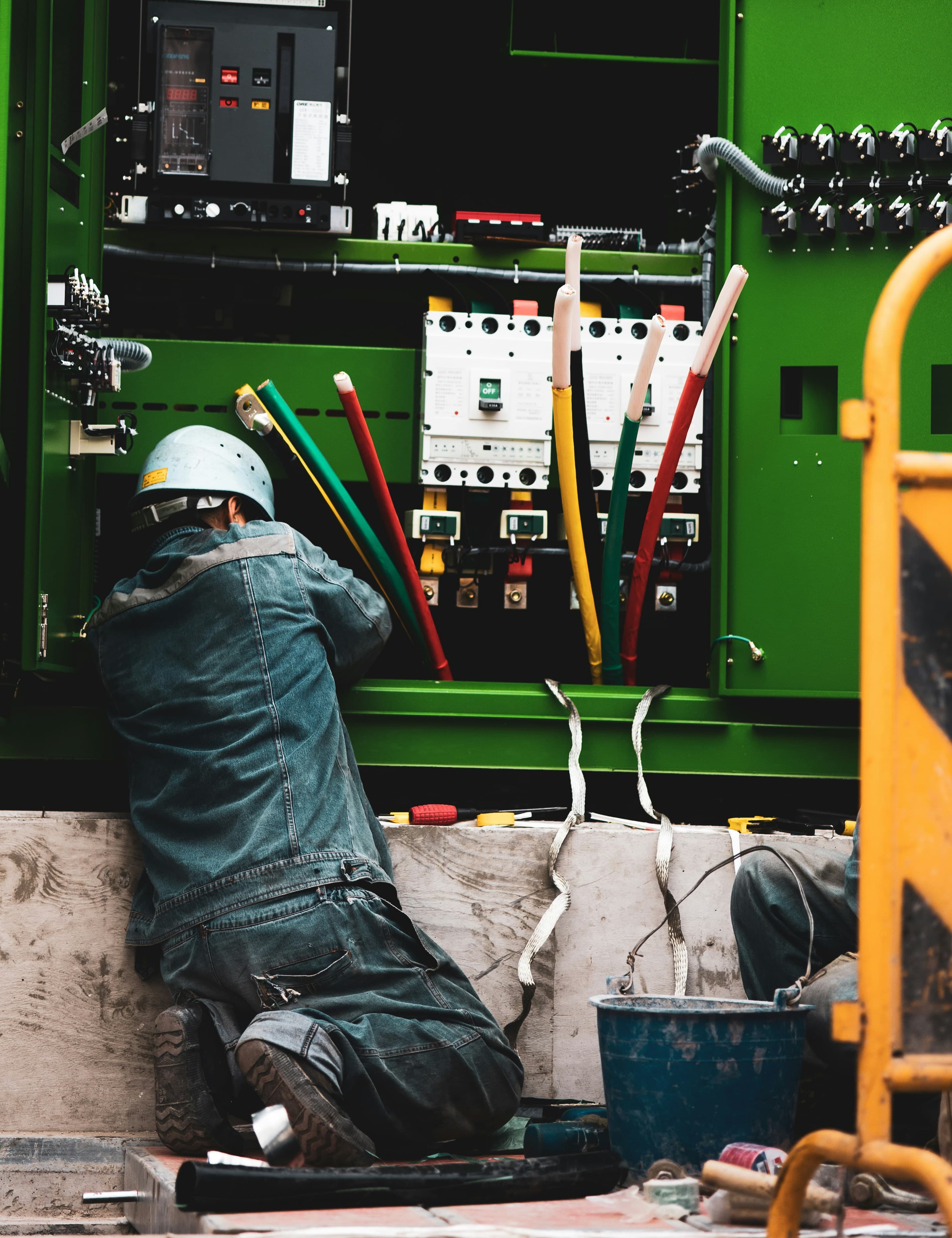 Electrician completing professional electrical work